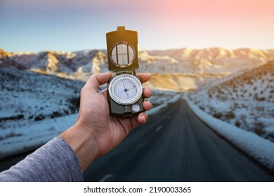  Compass In The Hand Of A Man In Snow Road.