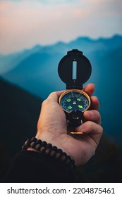 Compass In Hand Navigation Direction Purpose Concept