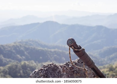 Compass Hiking Poles On Top Mountain