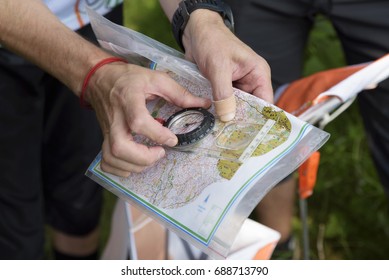 Compass and map for orienteering. Selective focus - Shutterstock ID 688713790