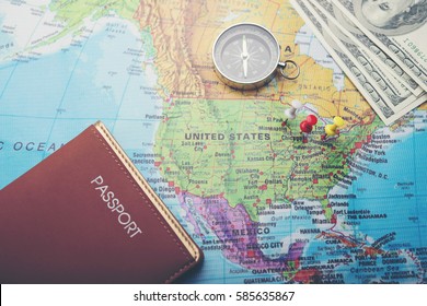 Compass, money and passport on world map background, Ready to go travel. Travel and holiday concept. Pin on the place to go.