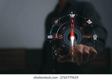 A compass for navigating towards a goal. Setting the direction for successful business requires good planning, strategic growth goals, and striving to be number one in achieving them.