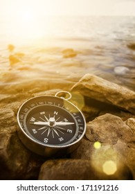 compass on the bank with sunflare - Shutterstock ID 171191216