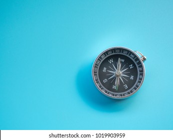 Compass On Blue Background