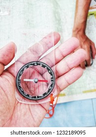 Compass is on the map, back ground, concept of using the compass and maps for travel in various places,Strengthen the business mind, the direction of business.