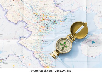 Compass on map background, Navigation tool for tourism and direction of travel