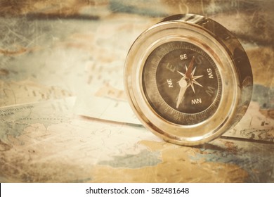 compass on map background travel. pointer. selective focus.  - Shutterstock ID 582481648