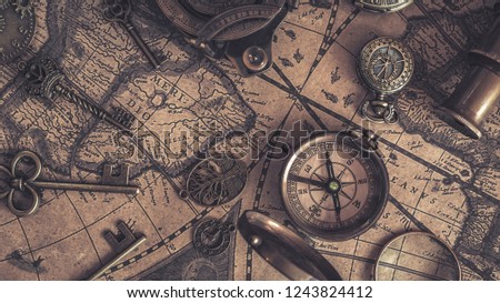 Compass On Old World Map
