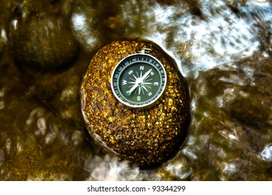 compass on the rock