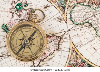 Compass on vintage ancient map, concept for direction transportation and travel - Shutterstock ID 1381579376