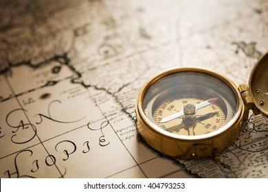 Compass On Vintage Map