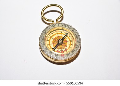 Compass on white. Navigation device and nothing more.
