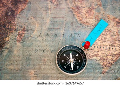 Compass Put On Australia Country Over Blur Blue Paper With Text '' Next Travel'' On Blurred Vintage Map. Travel And Tourism Concept Or Used For Voyage Trip Travel Advisor Agency Concept.