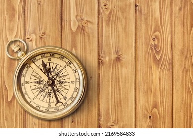 Compass. Traditional navigation device indicating the cardinal points (north, south, east, and west). - Shutterstock ID 2169584833