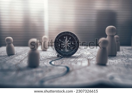 Compass and The wooden doll represents the employee of the company on route map represents networking, connection.  Corporation, Enterprise concept.