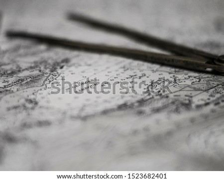 compass world map close up macro photography black and white