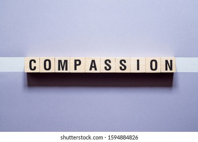 Compassion word concept on cubes