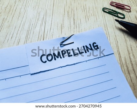 Compelling writting on table background.