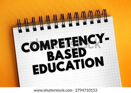 Competency-Based Education text on spiral notebook with grid paper, innovative academic model emphasizing student mastery of specific skills and knowledge before advancing through educational curriculum
