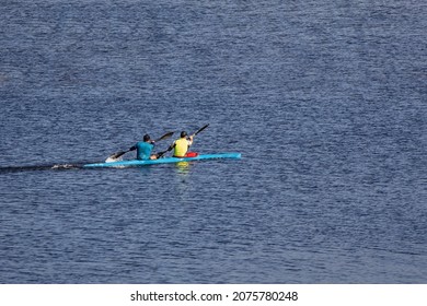 Competition Boat With Two Rowers At Sea