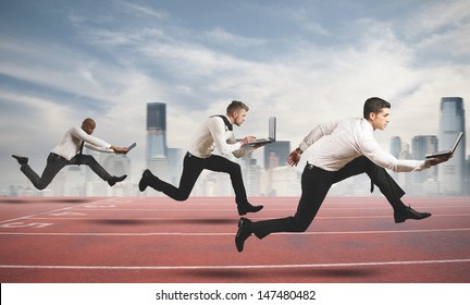 Competition in business concept with running businesspeople - Shutterstock ID 147480482