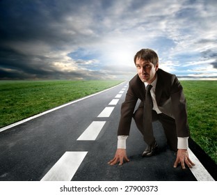 Competition Concept: Business Man Starting A Running