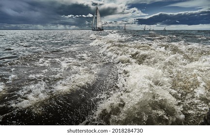 Competition Of Sailboats In Regatta At Storm Weather, Race, Big Waves, Sail Regatta, Cloudy Weather, Main Sail, Jib, Team Work, Splashes