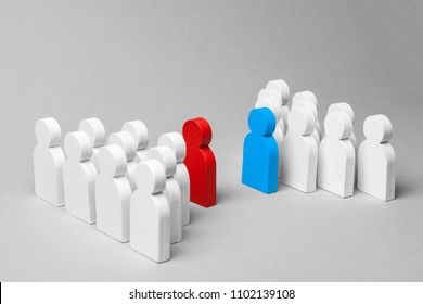 Competition Of Two Business Teams. Two Groups Of People In The Discussion. Conflict Among Workers. Group Of White Men With Their Leaders Of Red And Blue. Concept