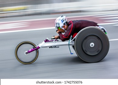 competition wheelchair in motion blur at the stadium