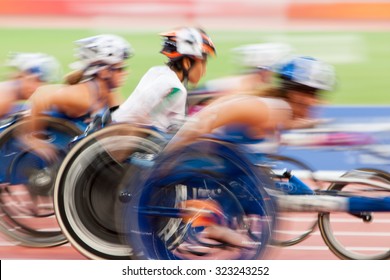 competition wheelchair in motion at the stadium
