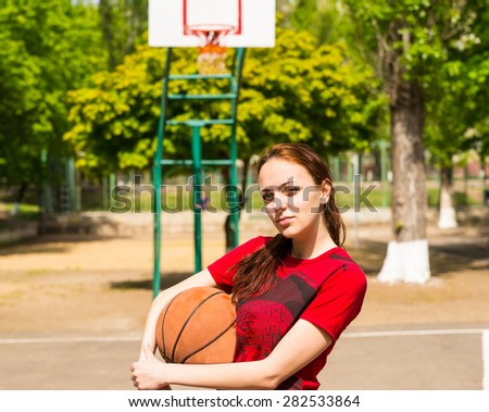 Similar – Foto Bild roter Basketballplatz mit weißen Linien auf der Straße