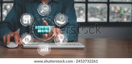 Competitor analysis concept, Businessman using computer and hand touching analysis, market, pricing, competitor, location and opportunities icon on virtual screen.