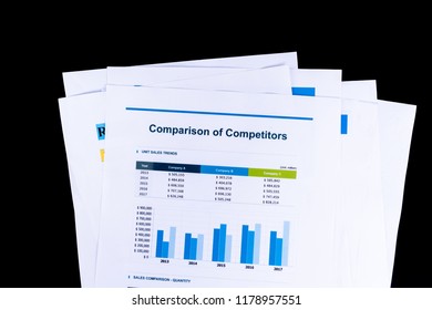 Competitor Comparison Analysis And Market Research Sheet Documents Papers With Black Background, Business And Office Concept.