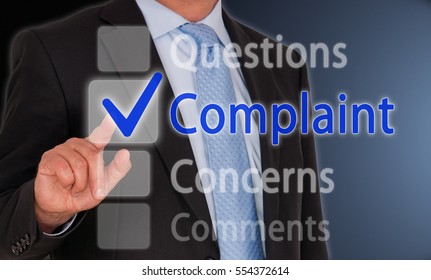 Complaint Questions Concerns Comments - Businessman With Touchscreen