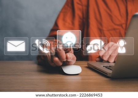 Complaints concept, Businessman using laptop omputer with complaints icon on vr screen, dissatisfaction from product or service problem, angry feedback from client.