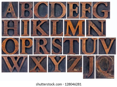 Complete English Alphabet  In Vintage  Wood Type - A  Collage Of 26 Isolated Letterpress Printing Blocks Stained By Ink