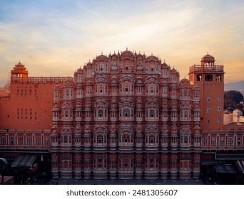 Complete front elevation of Hawa Mahal, jaipur with a dramatic sky. Exterior of famous ancient Hawa Mahal palace in Jaipur, Rajasthan state, India - Powered by Shutterstock