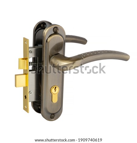 Complete set of mortise lock in bronze color with a rectangular bolt and latch on a white background