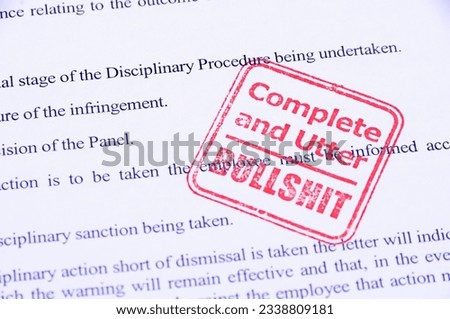 Complete and utter bullshit stamp on a page containing disciplinary procedures