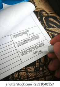 completed and signed worksheet on the table