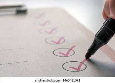 Completed tasks are ticked off on a to-do list - Shutterstock ID 1465411091