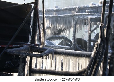 Completely burned auto on the massive barricades on Hrushevsky street during anti-government protest Euromaidan in Kyiv, Ukraine on January 2014 - Shutterstock ID 2196924693