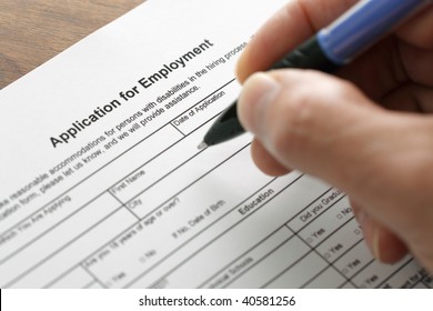 Completing an employment application form with focus on heading - Shutterstock ID 40581256