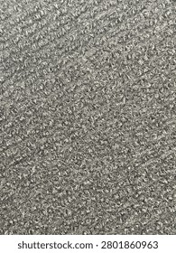 A complex black and white stereogram pattern designed to create a hidden 3D image when viewed with proper focus.
