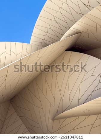 The complex form of the desert rose, found in Qatar's arid desert regions, inspired the striking design of the National Museum of Qatar (NMoQ) building