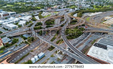 Complex Highway Interchange in Brisbane with Overlapping Roads and Urban Infrastructure