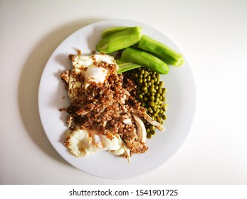 Complex lunch. Buckwheat, eggs, cucumbers and peas. 