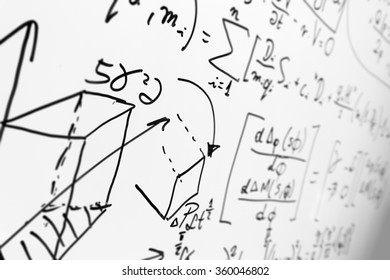 Complex Math Formulas On Whiteboard. Mathematics And Science With Economics Concept. Real Equations, Symbols Handwritten By A Professional. 