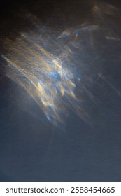 Complex patterns of light emerge through refraction and interference, showcasing a futuristic atmosphere with hints of vibrant colors against a dark background.