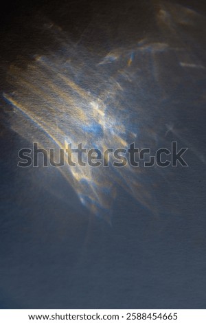 Complex patterns of light emerge through refraction and interference, showcasing a futuristic atmosphere with hints of vibrant colors against a dark background.